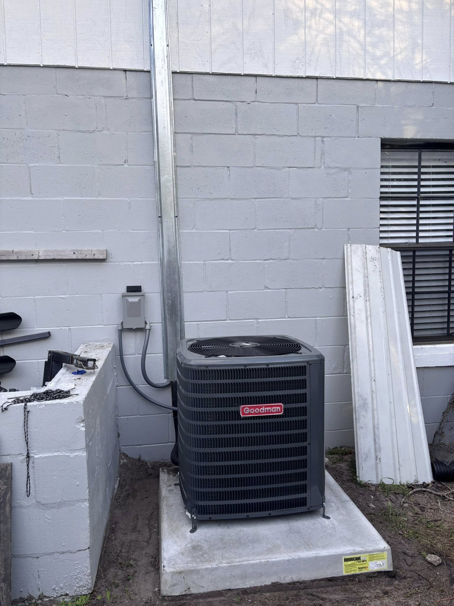 Goodman condenser pared de bloques